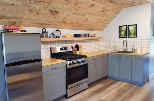 Houghton Apartment | Modern Off-grid Studio Loft on Farmstead in Houghton