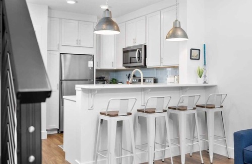 Traverse City Condo | Modern TC Condo w/Patio Close to Beach