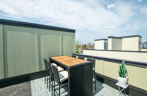 Traverse City Condo | Modern TC Condo w/Patio Close to Beach