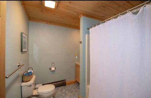 Bryant Pond Ski Chalet | Mountain getaway overlooking Lake Christopher