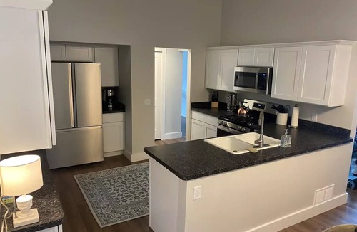 Frankfort Apartment | Nestled in the woods & steps from Main St./Beach