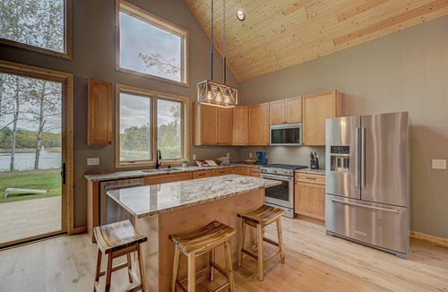 Hayward Ski Chalet | New 3 Bedroom Chalet on 26 acres, private 4 acre water feature, next to trails.