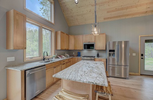Hayward Ski Chalet | New 3 Bedroom Chalet on 26 acres, private 4 acre water feature, next to trails.