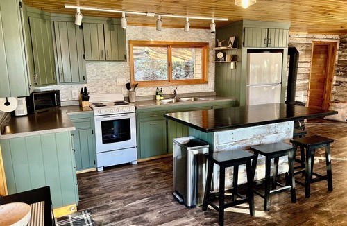Makinen Cabin | New - Cozy lakefront cabin on private wooded peninsula with bunkhouse and sauna