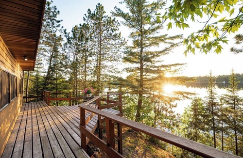 Makinen Cabin | New - Cozy lakefront cabin on private wooded peninsula with bunkhouse and sauna