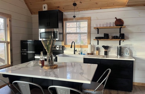 Welchs Creek Cabin | New, modern cabin with private lake and hiking