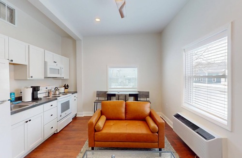 Marion Apartment | Newly renovated 1-bedroom apartment designed for comfort and convenience. Enjoy a king bed, 65” Smart TVs in the living room and bedroom, a fully stocked kitchen, workspace, and in-unit washer/dryer. Perfect for visiting Indiana Wesleyan University,
