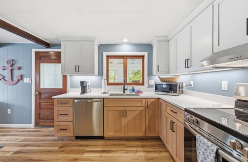 Ogunquit - Wells Cottage | No R-Egret | Moody Beach, Wells, Maine. Cozy 3BR beach retreat with marsh views, fire pit, and a short stroll to Moody Beach. Perfect for families, couples, and friends seeking a classic Maine coastal getaway.