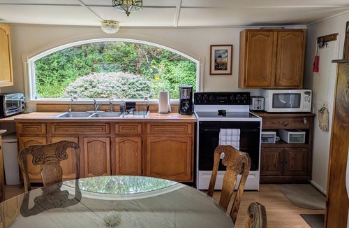 Mid-Coast and Islands Cottage | Ocean's Edge sits right on Stover's Cove.