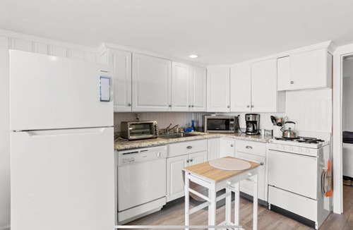 Hampton Condo | On the Beach-Dog Friendly 2BR Condo walk to the waves.