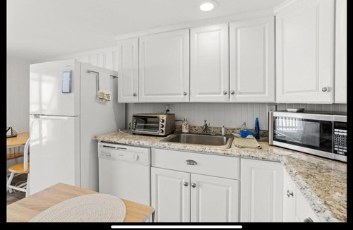 Hampton Condo | On the Beach-Dog Friendly 2BR Condo walk to the waves.