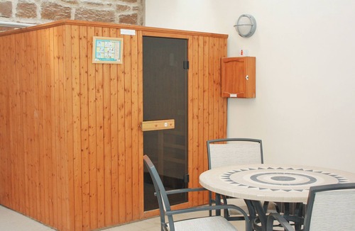 Warenford Cottage | One of five holiday homes with swimming pool, gym and tennis courts on site.