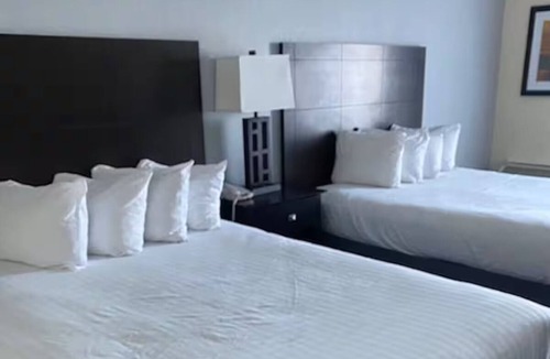 Houghton Lake Hotel | One Room w/Two Queen Beds | Breakfast Included | Direct Pool & Lake Access
