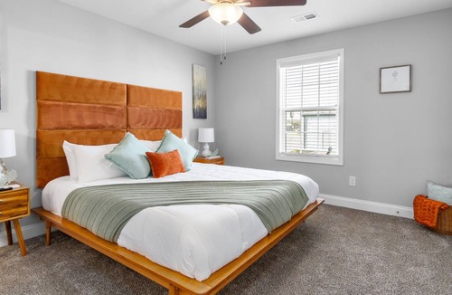Clarksville House | Orange Bliss Hideaway: A Slice of Peace and Quiet in the Middle of the Action
