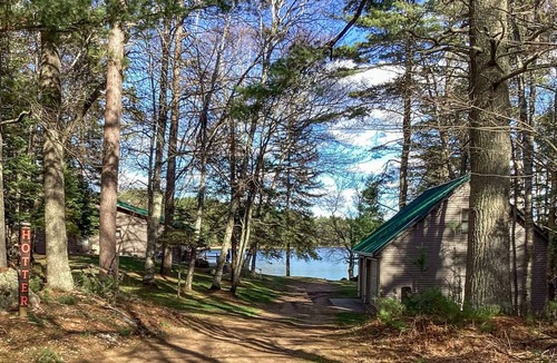 Rhinelander House | Peaceful, quiet lakefront dog-friendly cabin w/fishing dock, boats, campfire pit