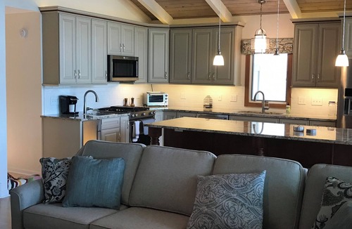 Pentwater Cottage | Pentwater Oasis, 4-bedroom house on Pentwater Lake, private docks available