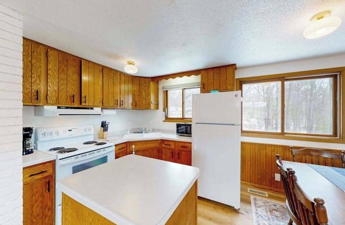 Eagle River House | Pickerel Lake cabin w/kayaks, dock, patio, grill & direct access to trails!