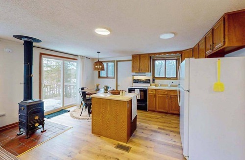 Eagle River House | Pickerel Lake cabin w/kayaks, dock, patio, grill & direct access to trails!