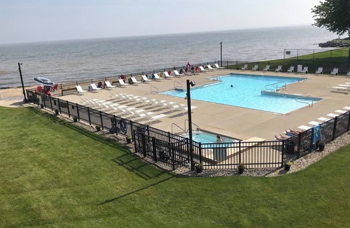 Port Clinton Condo | Pool and hot tub open! Birdwatching and fishing at its best. First floor!