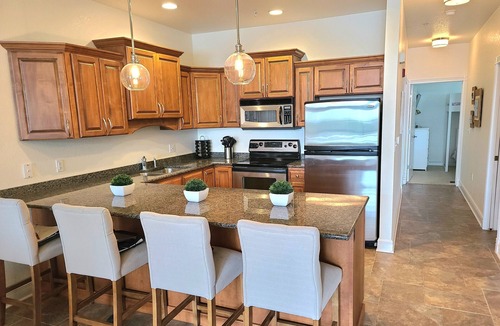 Elkhart Lake Condo | Premier View and Patio Overlooking Elkhart Lake! Two minute walk to bars/dining!