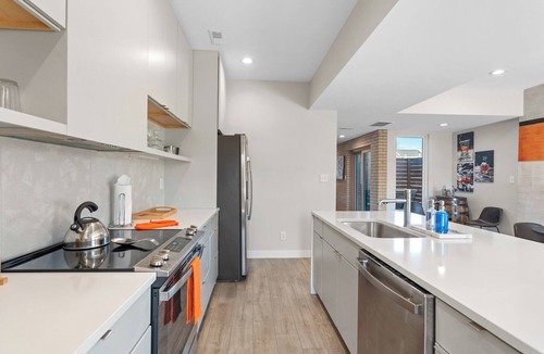 Phoenix Hill House | Prime NULU Escape: Sleek 4BR w/Hot Tub & Style