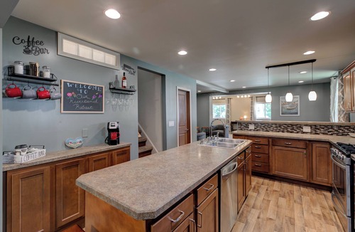 Croswell House | Private access Riverbend Retreat, fishing, canoes, wildlife, & swinging bridge