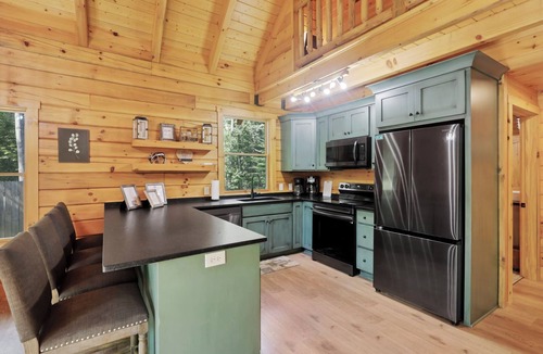 Logan Cabin | Private Cabin with Hot Tub, Massage Chair, Pool table, TT & Arcade Games