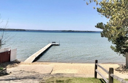 Higgins Lake Cabin | Private wooded cabin on one+ acre less than 1 mile from beautiful Higgins Lake.