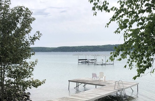 Frankfort Cottage | Quaint cottage on Crystal Lake with 100ft of private, sandy beach frontage.