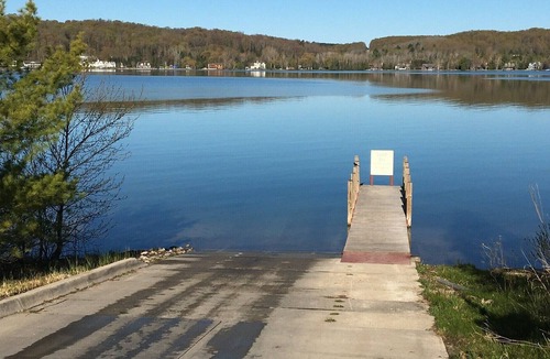 Petoskey Cottage | Quaint cottage with 2 separate homes and dock on the North Arm of Walloon Lake.