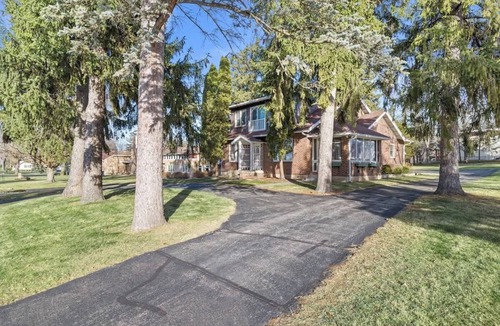 Green Lake House | Red Brick Home Near Lake