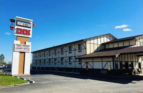 Wolf Point Hotel | Relax and Unwind in our Charming Room w/Free Parking | Travelers Convenience