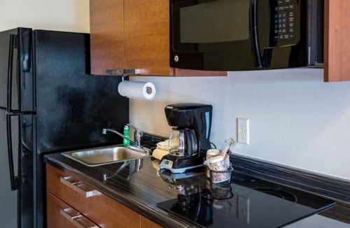 Jamestown Hotel | Relax in a Welcoming 2-Queen Room with kitchenette