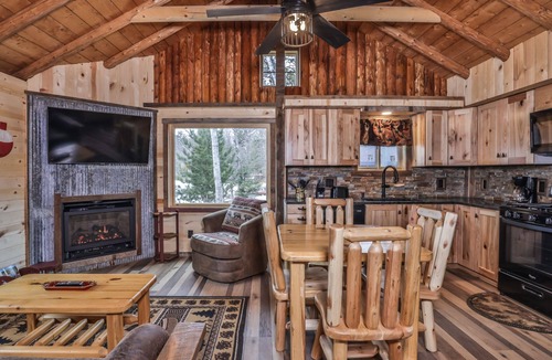 St Germain House | Remodeled lakeside resort cabin with fireplace, sandy beach, dock, firepit!