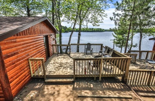 St Germain House | Remodeled lakeside resort cabin with fireplace, sandy beach, dock, firepit!