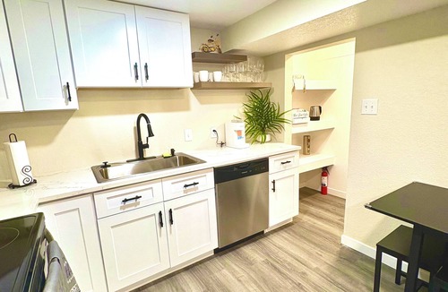 Federal Heights House | Renovated Private Residence Below basement, Garage, EV charger, Fenced patio.