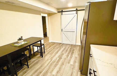 Federal Heights House | Renovated Private Residence Below basement, Garage, EV charger, Fenced patio.