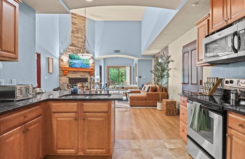 Wisconsin Dells Condo | Riverfront Getaway - Mins to Waterparks/Downtown - Private 1st Floor Porches