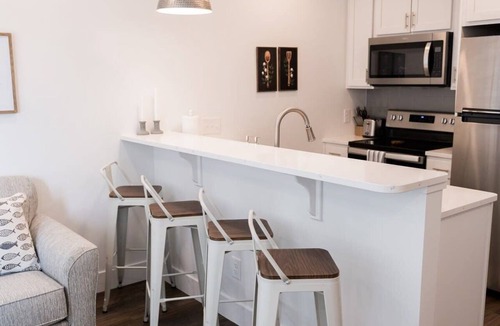 Traverse City Condo | Rooftop Condo in TC w/Bay Views