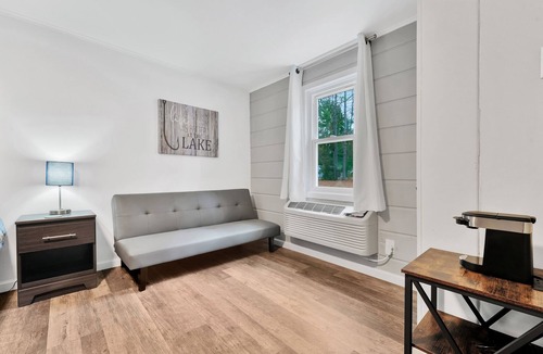 Houghton Lake Hotel | Room #8: Updated King Suite w/small couch
