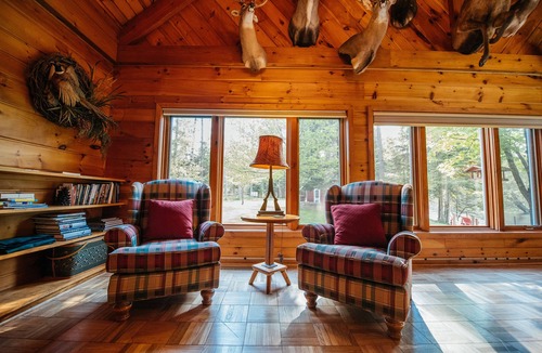 Grayling Cabin | 🦌 Royal Stag Lodge – Au Sable Riverfront | Near Garland, Grayling | Game Room | Pet-Friendly
