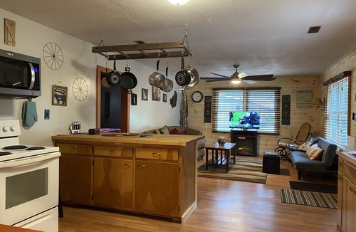 Prudenville House | Rustic home on wooded lot, very private. Lake and dock access. Close to trails.
