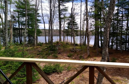 Franklin Cabin | Rustic off grid experience lakefront with beautiful sunrise view of Schoodic Mtn