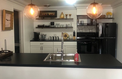 Grand Haven Apartment | Sand suite is perfect for summer fun! Pets considered with fee.