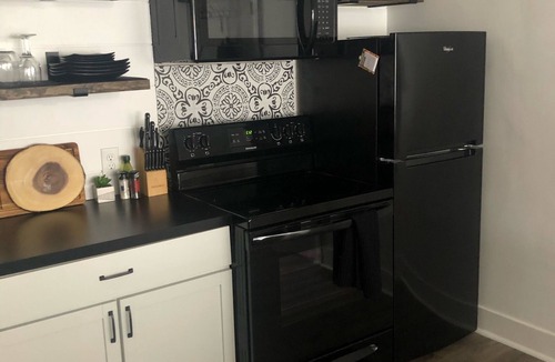 Grand Haven Apartment | Sand suite is perfect for summer fun! Pets considered with fee.