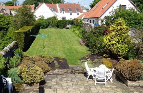 Crail Cottage | Sandcastle Cottage, Crail with large garden on Fife Coastal Path by Roome Bay