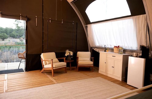 McIntosh RV Rental | Scenic King Glamping Tent with AC & Mountain Views near Mountainair in Torreon, New Mexico