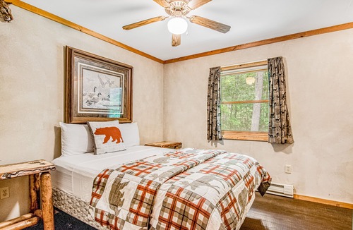 Lac du Flambeau House | Secluded dog-friendly home with dock, woodstove, porch, firepit, kayaks, & bikes