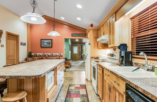 Lac du Flambeau House | Secluded lakefront home with kayaks, canoe, swim platform, firepit, & W/D