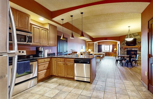 Wisconsin Dells Condo | Side-by-side condos with in-room Jacuzzi, two fireplaces, & full kitchen